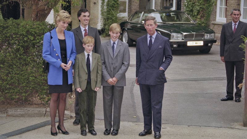 British Royal Diana, Princess of Wales (1961-1997), wearing a blue jacket over a black dress, with Eton housemaster Dr. Andrew Gailey, Prince Harry, Prince William, and Prince Charles outside Manor House on Prince William&apos;s first day at Eton College in Eton, Berkshire, England, Sept. 16, 1995. (Princess Diana Archive/Hulton Archive/Getty Images/TNS). “The Princess,” a Princess Diana documentary