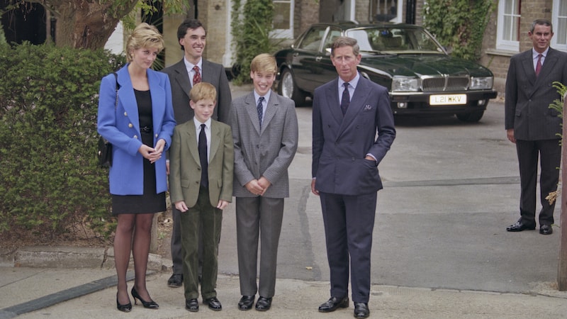British Royal Diana, Princess of Wales (1961-1997), wearing a blue jacket over a black dress, with Eton housemaster Dr. Andrew Gailey, Prince Harry, Prince William, and Prince Charles outside Manor House on Prince William's first day at Eton College in Eton, Berkshire, England, Sept. 16, 1995. (Princess Diana Archive/Hulton Archive/Getty Images/TNS). “The Princess,” a Princess Diana documentary