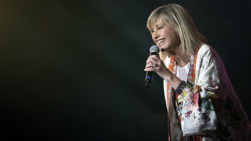 Olivia Newton-John performs during Fire Fight Australia at ANZ Stadium on Feb. 16, 2020, in Sydney. Newton-John died Monday, Aug. 8, 2022, at age 73. CREDIT: Cole Bennetts/Getty Images/TNS) Image