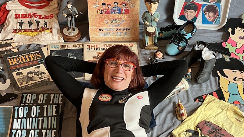 Author of the new Beatles book, Laurie Jacobson, surrounded by some of her Beatles memorablia - photo credit Jon Provost Image