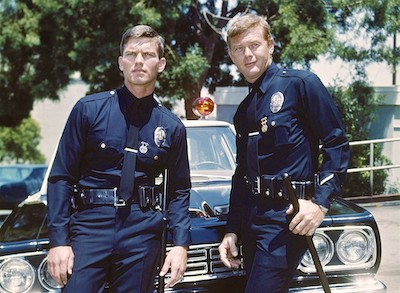 Kent McCord and Martin Milner in Adam-12 - NBC publicity photo