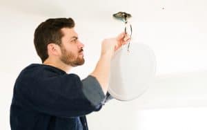 contractor doing electrical work. photo by Antoniodiaz Dreamstime. The “cougar” – an older woman – finds herself attracted to a much younger man – the contractor working on her house, no less. See what Ask Amy advises. Image