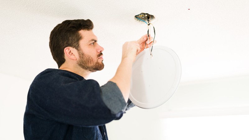 contractor doing electrical work. photo by Antoniodiaz Dreamstime. The “cougar” – an older woman – finds herself attracted to a much younger man – the contractor working on her house, no less. See what Ask Amy advises.