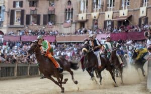 horses racing at the Palio di Siena. Photo by M. Rohana, Dreamstime. Travel writer Rick Steves takes us to Italy’s world-famous horse race, the Palio di Siena, a proud 500-years-old tradition. Image