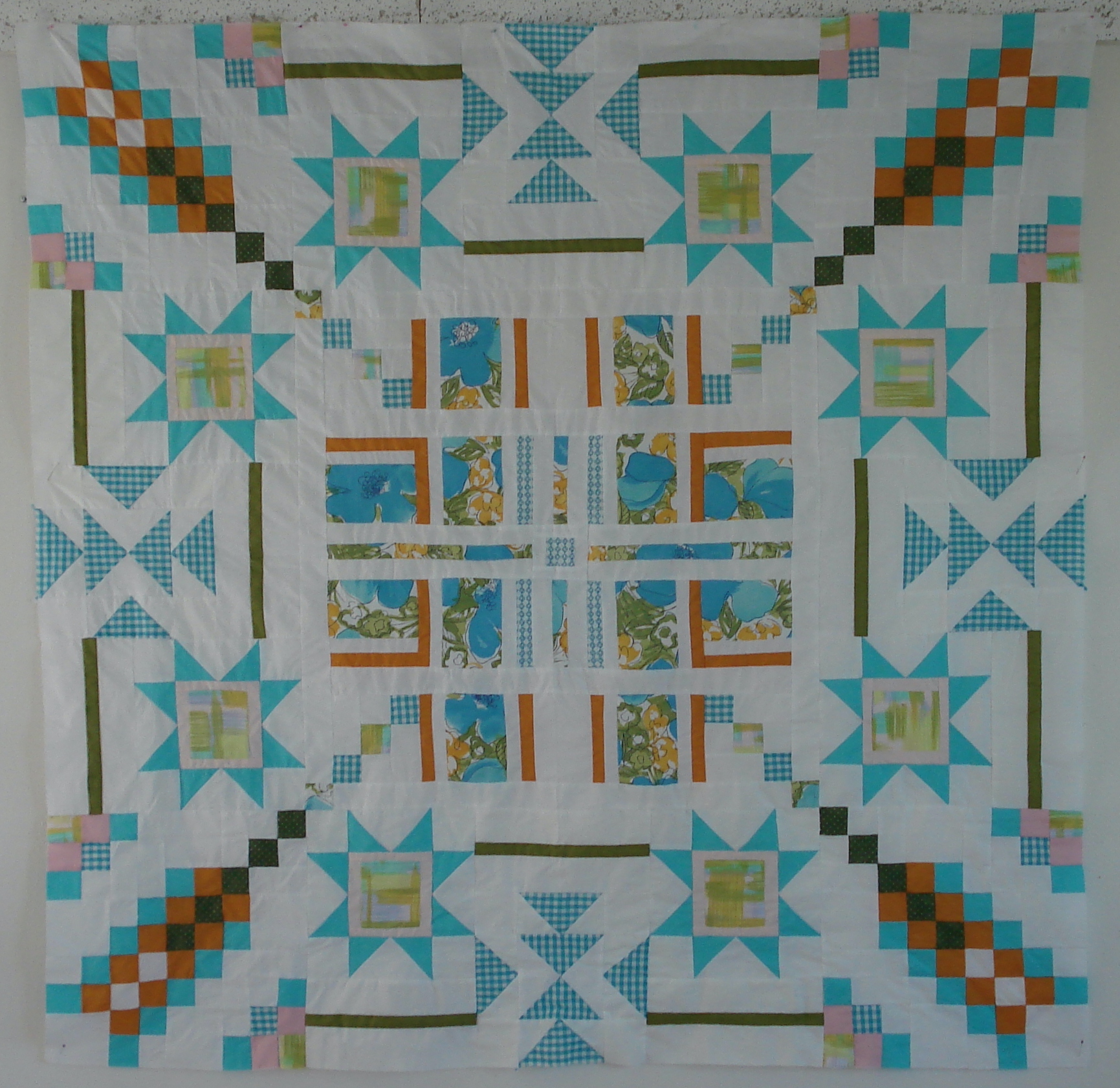 The quilt that Diann Logan made using her mother's aprons.