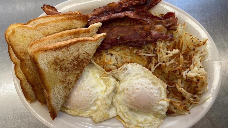 Charlie's Way Platter, a breakfast platter, pictured here with two fried eggs, hash browns, bacon, and toast. Richmond food and travel writer Steve Cook takes us to Charlie’s Way Kitchen, for food done right at a reasonable price – breakfast and lunch, in a pandemic-pivot food truck and “car wash” setting, from an experienced food-service family.