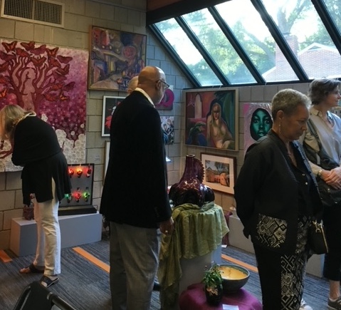 Guests browsing some of the art at Gallery at First UU in Richmond, Virginia