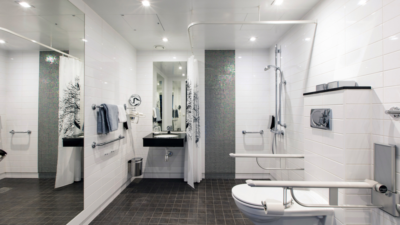 luxury accessible bathroom, photo by Bjorn Hovdal, Dreamstime. Many active adult communities have begun applying universal design principles in their residences to allow their residents to age in place.