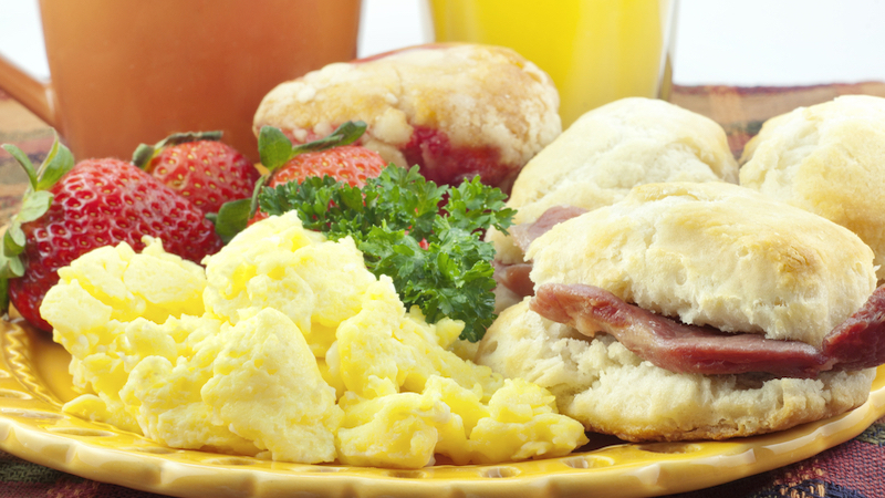 country breakfast with flaky biscuits and country ham, scrambled eggs, fresh strawberries, coffee and orange juice. Photo by Cheryl Davis, Dreamstime. Boomer goes to The Pickel Barrel for comfort food that will satiate your belly, from flaky biscuits with country ham to Southern supper gems.