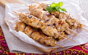 chicken kebabs. Elena Veselova, Dreamstime. Irrelevant satirists, beloved food festival, talented artists, masterful guitarist, James River love, all in What’s Booming: Fools and Foods. Image