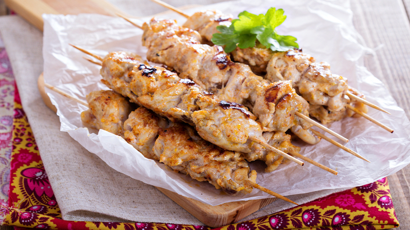 chicken kebabs. Elena Veselova, Dreamstime. Irrelevant satirists, beloved food festival, talented artists, masterful guitarist, James River love, all in What’s Booming: Fools and Foods. Image