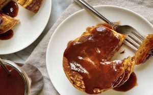 These fluffy pancakes are loaded with real pumpkin and sweet spices. These pumpkin pancakes use easy pumpkin puree, fall spices, and brown sugar to start a fall morning off right – or even brunch or supper! Image