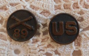 Julia Nunnally Duncan became enamored of her grandmother's treasures as a child and followed the story behind one: Her great-uncle Charlie Lynch's military collar disks. Image