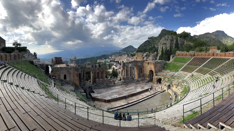The Greek theater in Taormina. Travel writer Rick Steves offers snapshots of the Greek island of Sicily – Mount Etna, Catania, Palermo, Cefalù – and its gruff, charming appreciation for life and Vespas. Image