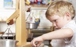 a young boy concentrating as he is playing learning game. Monkey business Images. An uncle is upset that his nephew toddler chooses not to hug him – and especially that the parents won’t force it. See what advice columnist Amy Dickinson says in this installment of “Ask Amy.” Image