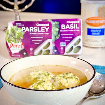 Herbed Matzo Ball Soup using Dorot Gardens flash-frozen herbs: These three Hanukkah recipes make that easy, enjoyable, and even nutritious. All were created by Food Network and TLC star George Duran: an Herbed Matzo Ball Soup, and Herbed Latkes, and Easy Chocolate Tahini Rugelach.