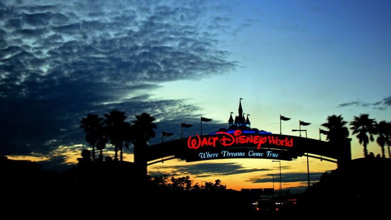 Wald Disney World entrance. image by Lucy Clark. A cheating, soon-to-be ex came on the family vacation his wife was paying for, despite her disapproval. See what “Ask Amy” has to say. Image