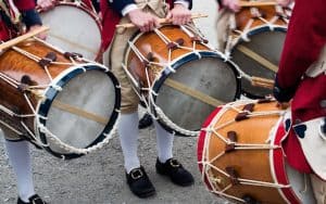 colonial drummers at Williamsburg/Jamestown, Virginia - image by Magmarczz. The theme of “Reign & Rebellion,” a new exhibition at two Virginia museums, sheds light on the country's early years and on today’s America. Image