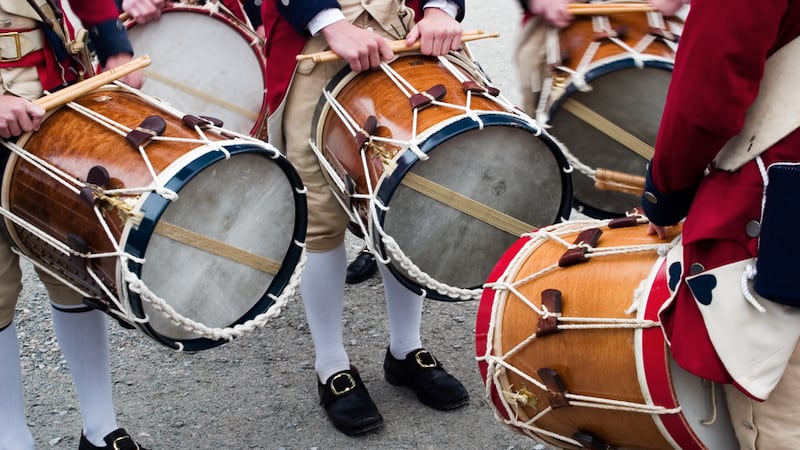 colonial drummers at Williamsburg/Jamestown, Virginia - image by Magmarczz. The theme of “Reign & Rebellion,” a new exhibition at two Virginia museums, sheds light on the country's early years and on today’s America.