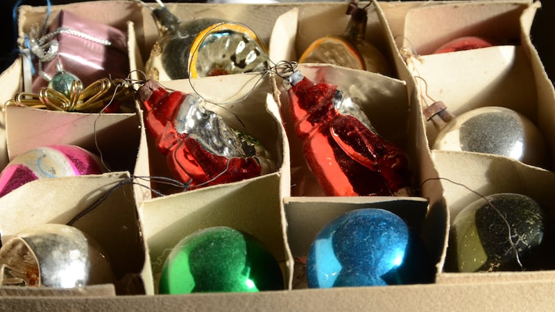 a box of old Christmas decorations. image by Kim Christensen. Some mementoes retain a rich meaning for years. For Boomer reader Julia Nunnally Duncan, her mother’s Christmas decorations have become more valuable with age.