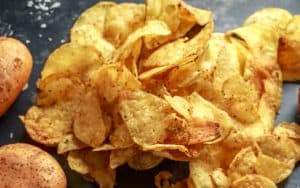 potatoes and potato chips. Image by Funandrejs. Looking for something warm, comforting, and economical? Salt and Vinegar Potato Soup is all three – plus it’s vegan and nostalgic! Image