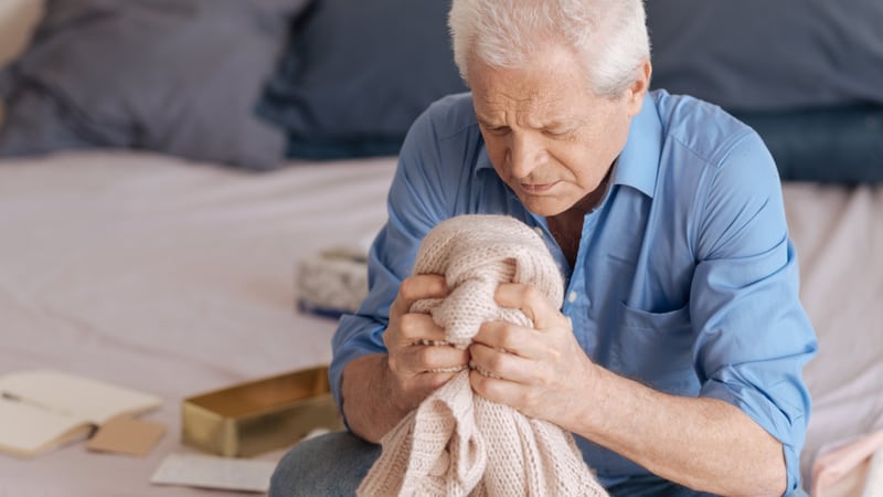 sad man clutching his loved one's sweater. Image by Dmytro Zinkevych. Grief manifests in many forms – including clutter and hoarding. See how Ask Amy advises this man who feels stuck in grief.