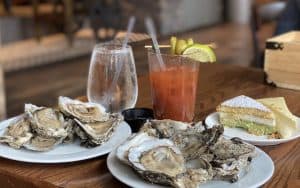 Brunch with raw oysters, a Bloody Mary, and more. Brunch at Grain at The Main put an end to Steve Cook's plans to explore Norfolk, VA. But oh, it warmed the cockles of his heart and belly! Image