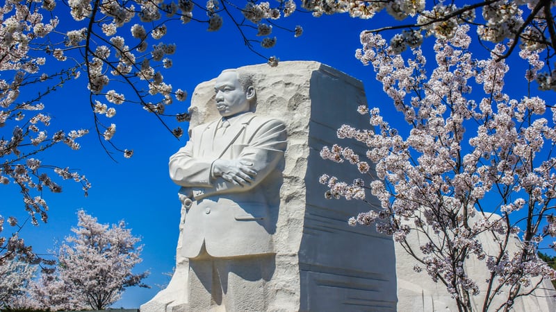 Martin Luther King Jr monument in Washington, D.C., surrounded by cherry blossoms. Image by Steven Roncin. Celebrate diversity & equality by honoring MLK Day and peace, + a Jewish Food Festival, Big Band music, and not-peaceful “Friday the 13th.”