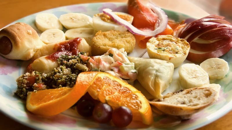 appetizer plate by Pierrette Guertin. Try these upscale appetizers and snacks: blue cheese potato chips, smoked ham and truffled cheese puffs, and smoked salmon and caviar sliders. Image