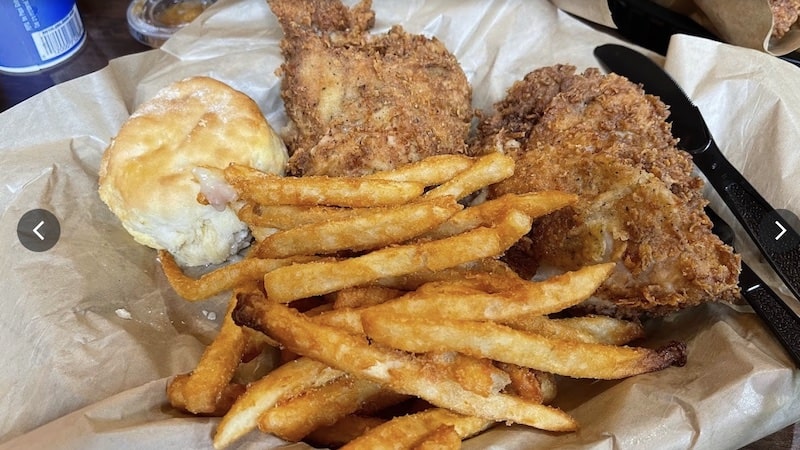 Mama's Chicken Kitchen fried chicken with fries and a biscuit. As part of A geezer's look at Gatlinburg, Tennessee, and two restaurants for grabbing Gatlinburg grub: Mama's Chicken Kitchen and Trish's Mountain Diner. Image