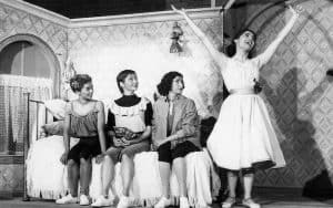 L-R: Elizabeth Taylor,[3] Carmen Gutierrez, Marilyn Cooper, and Carol Lawrence from the original Broadway cast sing 