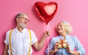 Couple celebrating Valentine's Day. By Roman Chazov. Wondering what to get your sweetheart for February 14? Writer Nick Thomas provides tongue-in-cheek Valentine’s Day advice. Image