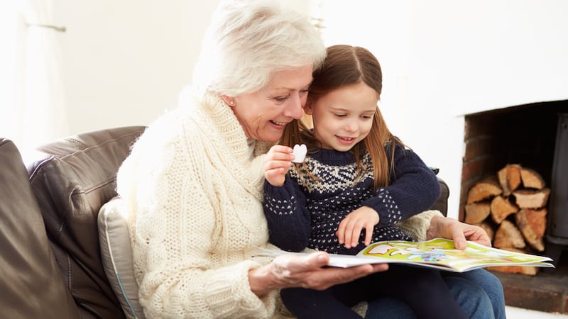 grandmother and granddaughter playing with sticker book. Parents know that they will face the proverbial empty nest when their children leave home, but Laurie Whitman experienced a second empty nest. She shares with Boomer readers her experience after her first granddaughter went to kindergarten. Image