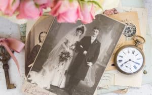 old family photos plus pink roses, an old key, and a pocket watch. By Neirfy. When Doreen Mary Frick first saw an old photograph of a young 1900s lady, she was immediately drawn to her. She discovered the woman’s identity, and her story, and shares with Boomer readers the story of Mary Jane, her grandmother. Image