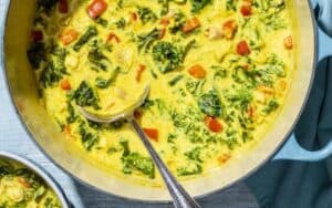 This hearty bowl of curried chicken soup with coconut and kale is the perfect meal to erase the chill outside, or just warm up your insides. Image