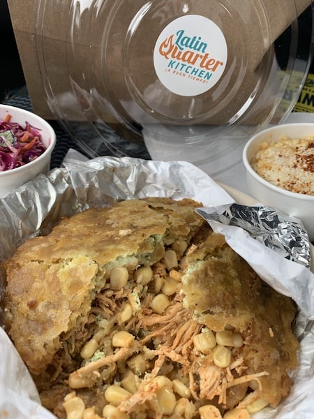 Latin Quarter El Chavo Patacon, smashed plantain sandwich with chicken, street corn, cotija cheese, shredded cheese, tajin seasoning, and jalapeño ranch was delicious and filling. The sides, of slaw and more street corn. From ChefSuite