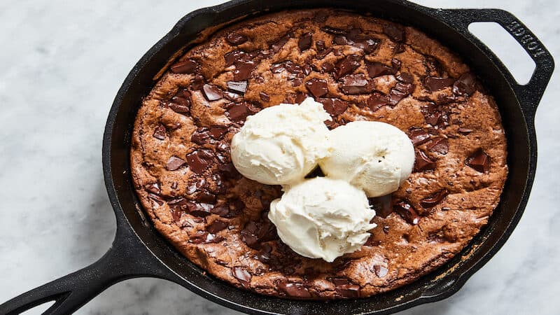 Skillet Brownies make the ultimate dessert even better: gooey in the center, crisp around the edge, with brown butter for rich caramel notes. Image