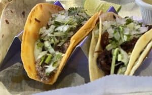 Closeup of three tacos. Life-changing tacos? That’s what food writer Steve Cook claims to have found at Lalo’s Pinches Tacos Bar and Grill in Richmond, Virginia. Image
