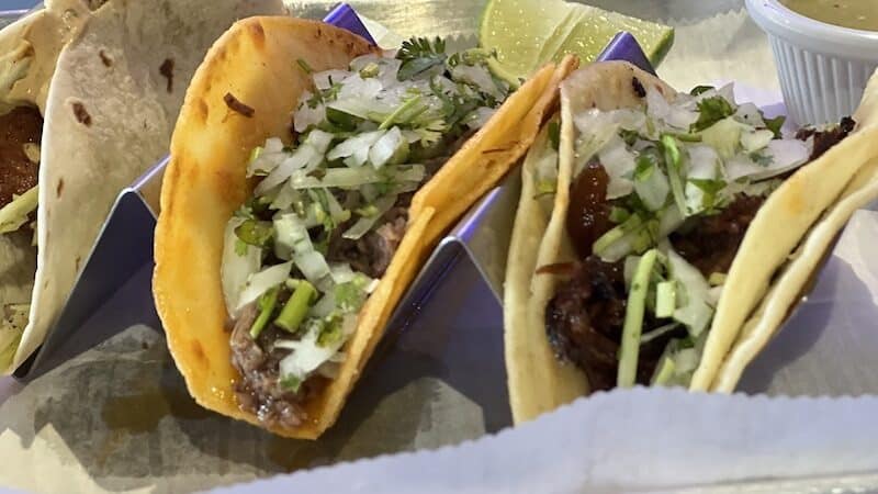 Closeup of three tacos. Life-changing tacos? That’s what food writer Steve Cook claims to have found at Lalo’s Pinches Tacos Bar and Grill in Richmond, Virginia. Image
