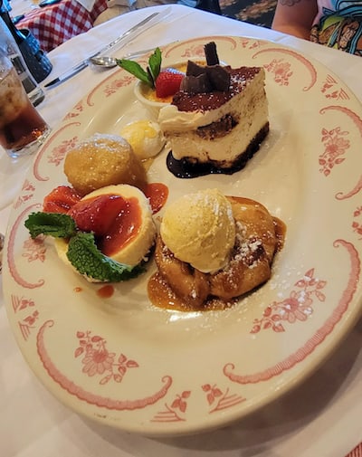 A platter of small-size desserts accompanies Maggiano's family style dining