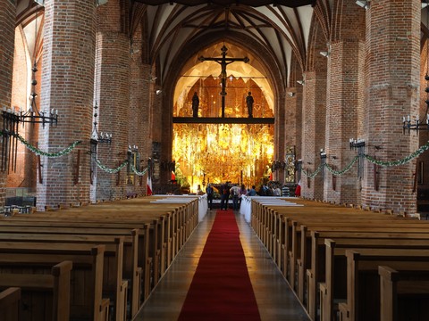 One of the most famous Church in Gdansk with the largest amber altar worldwide. This church made its name as a memorial to Poland’s recent history related to the Solidarity movement. Credit: Bluemoment Images.