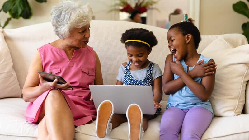 Grandma and two grandkids on a laptop, from Wavebreakmedia. Two Jumble puzzles, with ghostly math: play one with your favorite kid or use it as a warm-up, then tackle the more challenging puzzle. Image