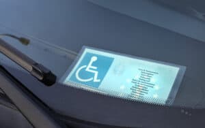 A woman resents her brother-in-law using an illegal handicap sticker and demands that her husband step in. See what advice columnist Amy Dickinson advises in “Ask Amy.” Image