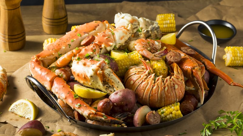 Celebrate the summer with good friends and a delicious seafood boil. This recipe from a Louisiana sous chef makes it easy. Image by Bhofact2