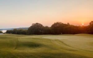 Golf course at sunset, at Tellico Village in Tennessee. The pandemic fueled a resurgence of people playing golf, which is also driving a migration to golf communities, including retirement communities. Image