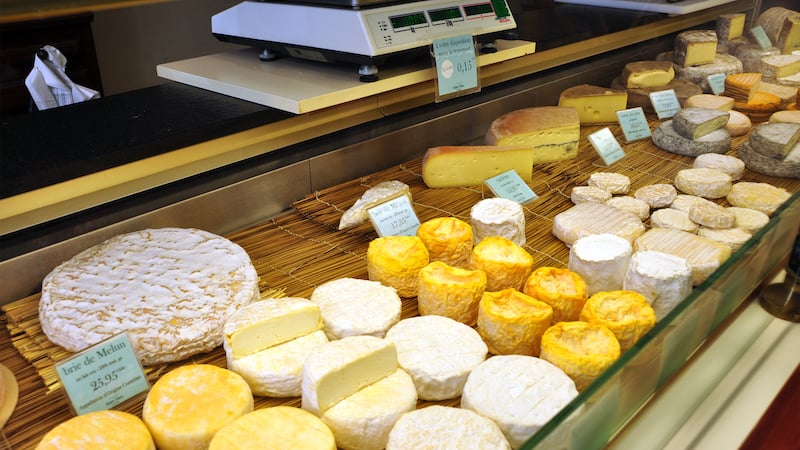 French cheeses in a store display case. Even seasoned travel writer Rick Steves used to be content with American cheese and deride certain “high-falutin’” Old World airs, but since connecting with people in Europe, he has changed his attitude.