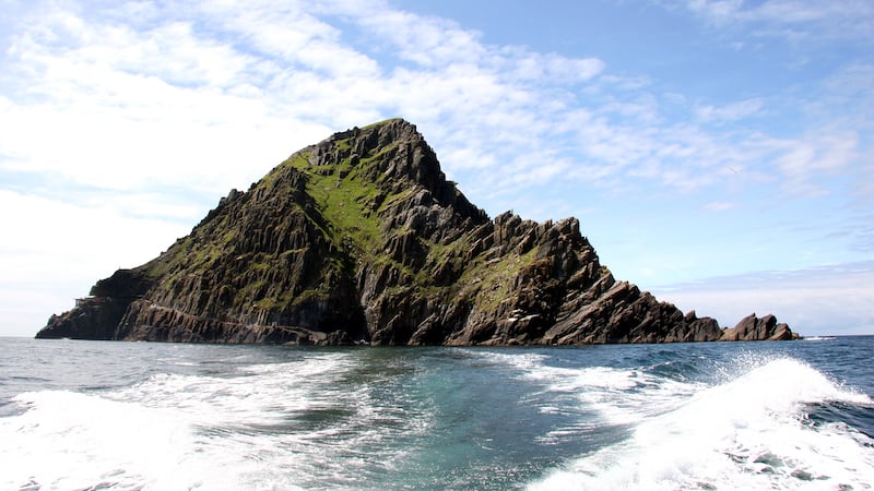 Hardy tourists visit the island of Skellig Michael, off the Ring of Kerry, where monks helped keep literacy alive in the Dark Ages. On Ireland's Ring of Kerry