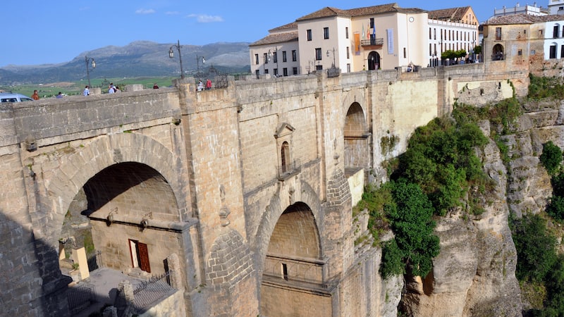 Ronda's New Bridge massively connects the old town with the new town. Spanish Ronda, birthplace of bullfighting, sits beside a massive gorge. Enjoy colorful history and must-see stops.