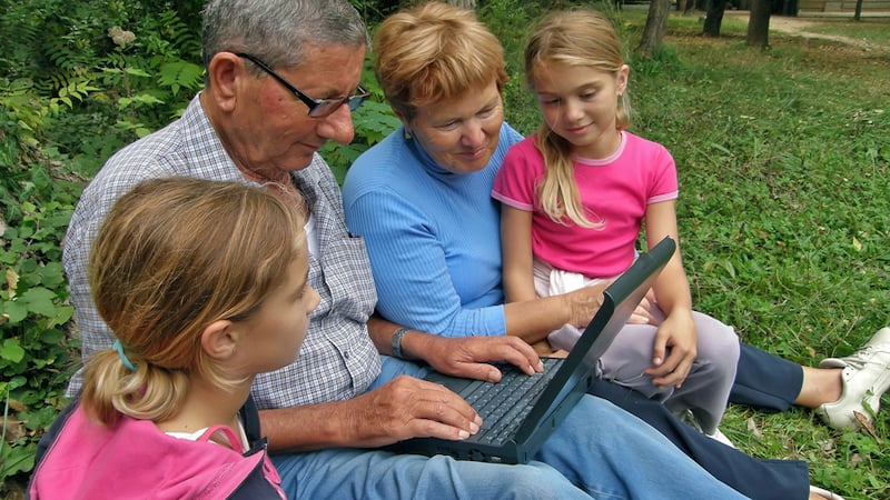 grandparents and granddaughters on a laptop, from Landd09. For Jumble puzzles, for kids and adults, with balloons and swine.