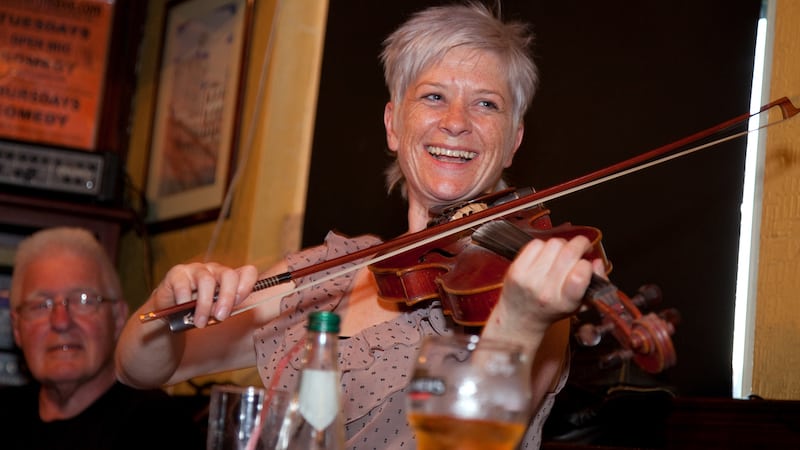 To find an Irish music session in a pub, wander a town and follow your ear. Follow the Irish love of music.